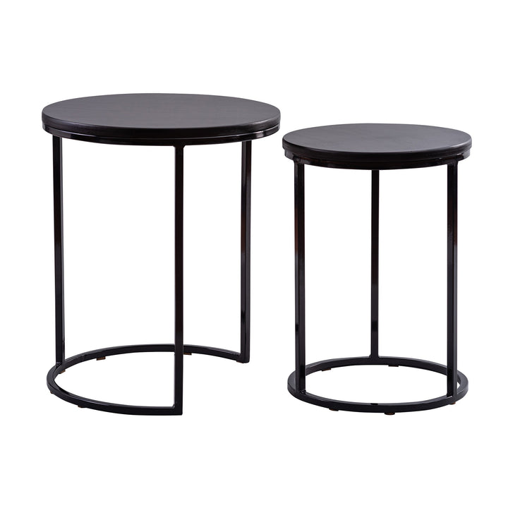 Set de dos mesas laterales redondas con cubierta teñida negra y base de acero negro