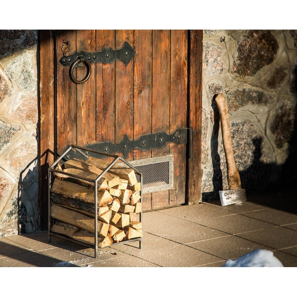 Leñero Nord Kallfü metal negro 40 cm — en ambiente