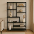 Librero Nol Kallfü metal negro, 160x35x180 cm — vista 3/4 con repisas escalonadas